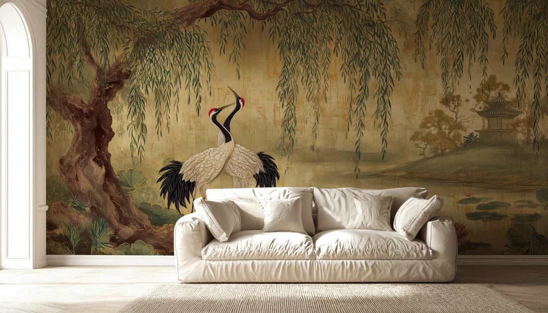 Lotus Pond crane and willow tree wall mural behind a neutral sofa in a bright living room